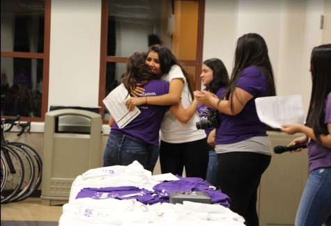 Senior Deisy Lara receives a hug from senior Abbi Lopez after her speech at the Dream Club Dinner