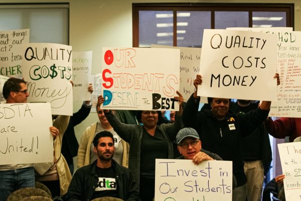 Navigation to Story: District teachers demand higher salaries