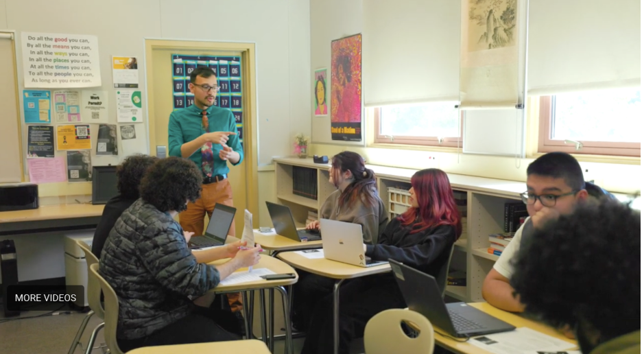 Mr. Bustos working with Digital Arts Academy students